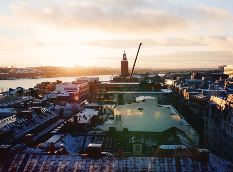 Winter sunset over Stockholm, with Stockholm City Hall in the background.